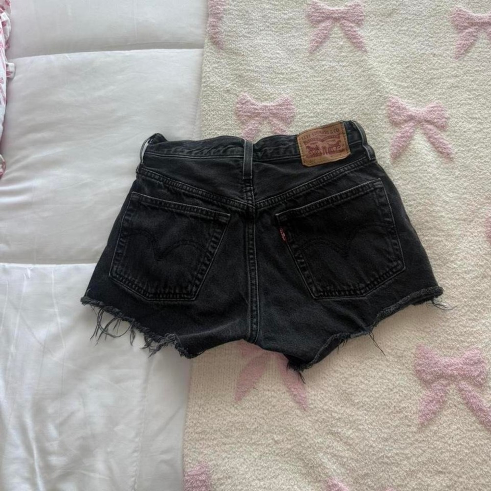 black distressed Levi's 501 denim shorts